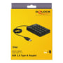 DeLock numerisk USB-tastatur med 19 sorte taster vises på den gule produktemballage sammen med kabel og USB-stik.