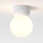 Astro Lighting Lyra Ceiling 180 loftlampe set forfra med en stor, rund lysende skærm og hvid fatning.