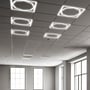Flere tændte V-TAC 60x60 LED-paneler med ottekantet lysramme ses monteret i et kontorloft.