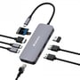 Verbatim USB-C Pro Multiport Hub CMH-09 med tilsluttede enheder som SD-kort, Ethernet-kabel og USB-stik.