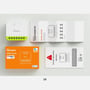 Sonoff MINI DUO smartrelæ ses sammen med orange emballage og hvide vejledninger med produkttegninger.