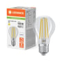LEDVANCE LED-standardpære med filamenter står ved sin æske, der viser 11 W, 1521 lm, 4000 K og E27-sokkel.