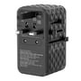 Verbatim UTA-06 GaN III universal rejseadapter placeret ved siden af et sort rejseetui.