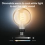 Philips Hue White Ambiance G125-pæren illustrerer dæmpning og justering af det hvide lys fra varmt til køligt.