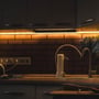 V-TAC LED stribe lys installeret under køkkenskabe, giver varm hvid belysning på 3000K mod murstensvæg.