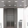 Illustration af moderne kontorindretning med V-TAC LED indbygningspaneler monteret i loftet ved en elevator.
