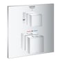 Grohe Grohtherm Cube termostatbatteri i krom med to firkantede greb, en til temperatur og en til flow, på en hvid baggrund.