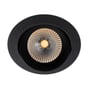 Nærbillede af SLC One 360° LED downlight i sort, viser den teksturerede overflade og det varme, hvide LED-lys.