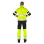 Bagfra visning af Kansas Fristads Hi-Vis softshell jakke i gul og sort, str. S, med synlige reflekterende bånd.