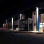 V-Tac Slimline LED-projektør på 30 W ses i brug med lys på en bygning om aftenen.