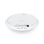 Ubiquiti U7 Pro WiFi 7 AP bagside, viser tilslutningsporte og monteringsmekanisme i hvid plast.