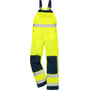 Frontbillede af Kansas HI VIS Overall KL2 1001 med et ben bøjet, fremhæver knælomme, sidelomme og reflexbånd med to syninger.