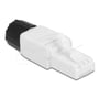 DeLock værktøjsfrit RJ45-stik Cat.6 UTP set skråt med en sort del monteret bag på det hvide stik.