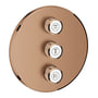 Grohtherm SmartControl triple volume kontrol sæt i børstet kobber med tre drejeknapper til vandstyring.