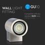 Frontalt billede af V-TAC GU10 væglampens fatningsåbning med tekst der angiver 'GU10' og 'Compatible with any standard GU10 lamp'.