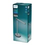 Philips Sword LED bordlampe i grå, 12W, med justerbar lysstyrke og farvetemperatur, præsenteret på emballagen.