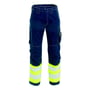 Tranemo Workwear Tera TX arbejdsbukser set forfra med sidelommer, cargolomme og synlighedsbånd i gul og sølv.