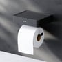 AM.PM Inspire V2.0 toiletpapirholder i mat sort med en monteret toiletpapirrulle, der viser dens funktion.