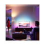 To genopladelige RGB+CCT-bordlamper lyser pink på en skænk under et tv i en stue.