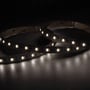 Ansell Lighting E-Cell Eco RGBW LED strip tændt med varmt hvidt lys, 50m, 24V, IP20, 4000K, 15W/m.