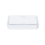 D-Link 5G NR AX3000 Wi-Fi 6 mobilrouter set lavt skråt forfra med den hvide, afrundede overflade synlig.