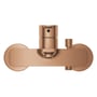 Grohe Lineare kar- og brusearmatur i børstet warm sunset-kobber set lige forfra, med tilslutninger synlige.
