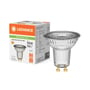 Ledvance LED-pære PAR16 står foran sin orange og hvide emballage, hvor 7 W, 750 lumen og GU10 fremgår.
