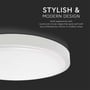 Nærbillede af V-Tac LED loftslampens hvide kant og afrundede design, med tekst om stilfuldt moderne design.