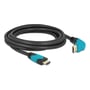 Sort Delock HDMI-kabel på 3 meter ligger oprullet med begge stik synlige, heraf ét 90° nedadvinklet.