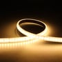 Ansell Lighting P-Cell LED bånd på 50 meter, viser varmt hvidt lys og 10mm bredde med detaljerede LED'er.