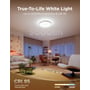 Govee Smart Ceiling Light Ultra lyser klart hvidt i loftet over en moderne stue med sofa og arbejdsplads.
