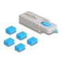 DeLock USB port blocker sæt, der viser det grå værktøj med fem løse, blå USB-blokkere spredt ud foran sig.
