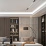 Elegant moderne stue med indirekte belysning fra V-TAC VT-3620 LED skinnespots på loftet.