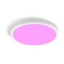 Philips Hue Devote loftslampe monteret i loftet og lyser i en levende pink farve.