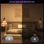 Dæmpning af lyset i et soveværelse med Philips Hue Essential pærer, der viser fuld lysstyrke (100%) og lav lysstyrke (2%) styret via Hue appen.