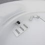 Detalje af indersiden af SpectrumLED Nymphea Flad Duo 24W LED loftlampen, med mærkater for farvetemperatur (3000K, 4000K, 6500K).