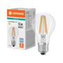 Ledvance LED standard VALUE filamentpære ved siden af emballagen, hvor 7,5 W, 1055 lm og E27-fatning fremgår.