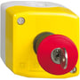 Detaljebillede af Schneider Electric nødstopbox i gul polycarbonat, viser det røde nødstop med nøgleindsats og skruemonteret låg.