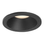 Astro 5793 Minima indbygningsspot i sort aluminium med rund form og GU10 fatning, vist med lys.