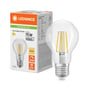 LEDVANCE LED-filamentpære med klar glaskolbe og E27-sokkel står ved siden af æsken med produktets specifikationer.