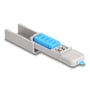 DeLock USB port blocker sæt med fem blå USB-blokkere klar til brug, vist på en hvid baggrund.