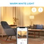 WiZ plafond lyser i varm hvid i en stue, med smartphone der viser indstillinger for 'Nicen afternoon' scene.