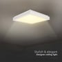 V-TAC firkantet LED loftlampe, tændt og udsender blødt, varmt lys, med teksten 'Stylish & elegant Designer ceiling light'.