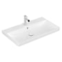 Villeroy & Boch Avento 4158 håndvask i hvid, set skråt fra den modsatte side med kromarmatur ved hanehullet.