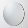 Loevschall Kontur spejl, rundt, Ø100 cm, med sort, skjult ramme, monteret på en lys væg for at demonstrere dets svævende udseende.