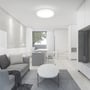 Moderne stueoplyst af V-TAC 18W LED dome lys monteret i loftet, der skaber en klar og behagelig atmosfære.